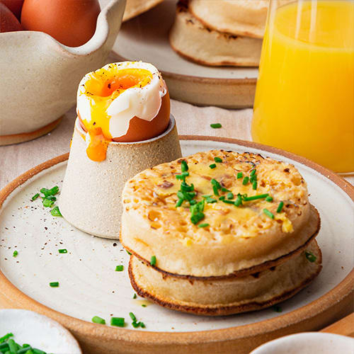 dippy eggs with anchovy butter crumpets