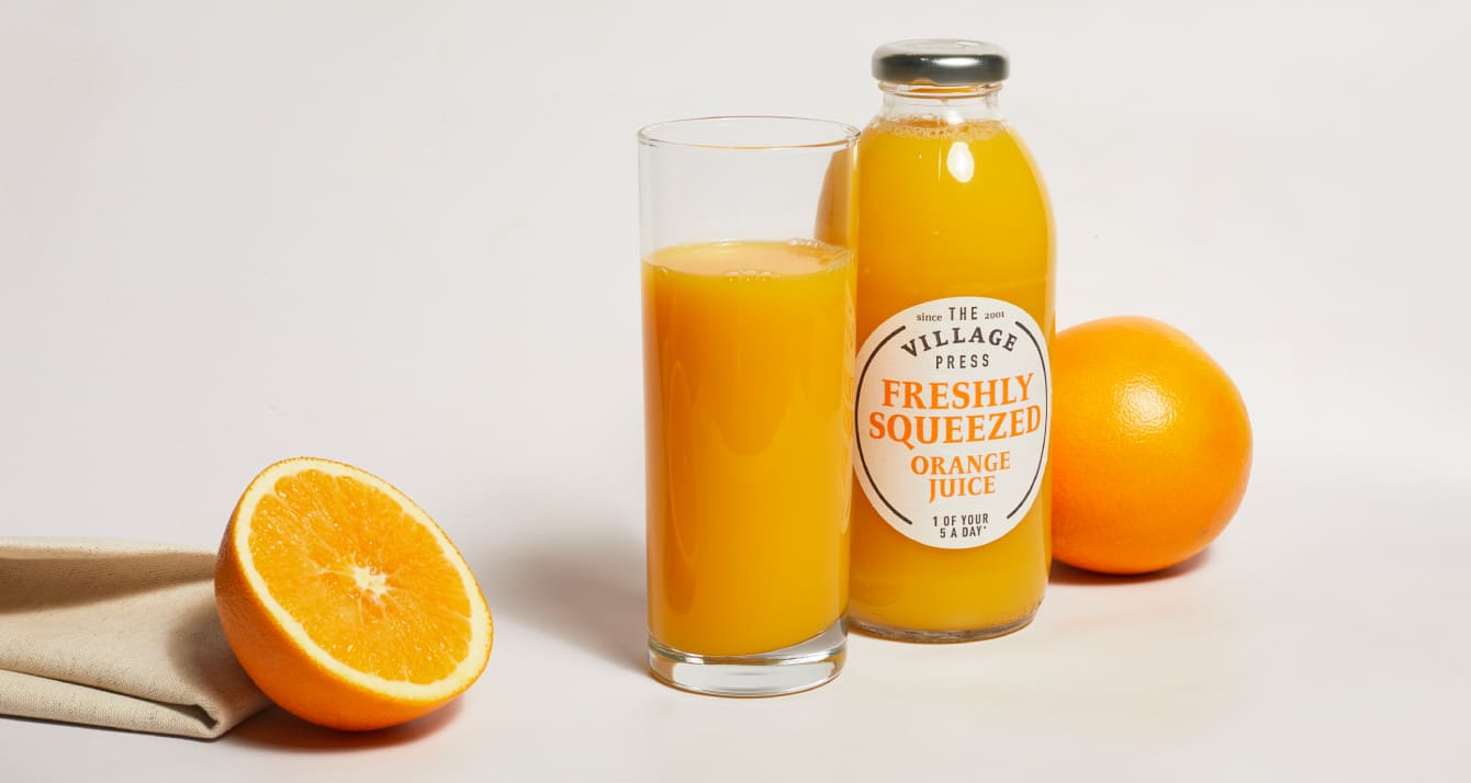 free orange juice in glass