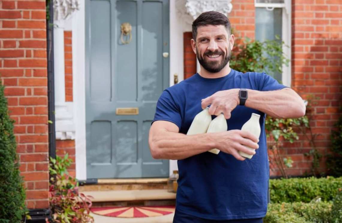 Milkman delivering milk